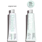 Two toothpaste tubes stand upright side by side. The left tube is labeled “Davids,” and the right tube, labeled “Hydroxi Whitening + Enamel Health Toothpaste w/nano hydroxyapatite, Kids+Adults,” features a “NEW LOOK same product” sticker above it, highlighting the packaging change for this fluoride-free Davids toothpaste formulated with nano hydroxyapatite for natural whitening.