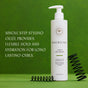 A bottle of Innersense Organic Beauty I Create Curl Memory - Sample styling gel next to two black metal springs on a green surface, with text reading Single step styling gelée provides flexible hold and hydration for long lasting curls.