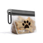 The (re)zip Take Me Too Pet Bag + Carabiner is a transparent, reusable dog treat bag with a black zipper, paw print design, and carabiner—ideal for leashes—and comes filled with bone-shaped treats. Brand name printed on the front.