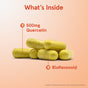 Six yellow capsules of Jarrow Quercetin 500mg - Bioflavonoid Veggie Caps are stacked on a peach background. Labels note antioxidant and immune support benefits. What’s Inside is shown above. Image for illustration purposes only.