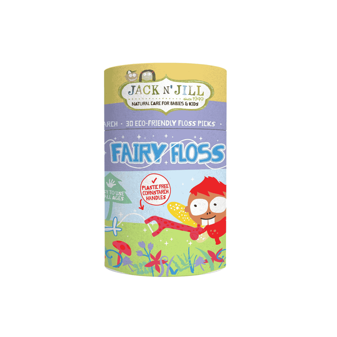 Jack N’ Jill Fairy Floss Floss Picks come in a cylindrical container with a cartoon fairy and colorful plants, designed for kids dental care. The label promotes eco-friendly, plastic-free corn starch handles.