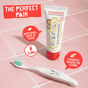 The Jack N’ Jill Tooth Buddy Pack features strawberry kids toothpaste and a white bunny-design toothbrush with a corn handle, displayed on pink tile. The natural, fluoride free toothpaste is safe for ages 12 months+.
