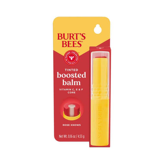 A yellow tube of Burt’s Bees Boosted Balm in packaging labeled with Vitamin C, E & F Core, Rose Knows shade, Net Wt. 0.16 oz/4.53 g, and featuring bright red and yellow colors for this natural lip care product.