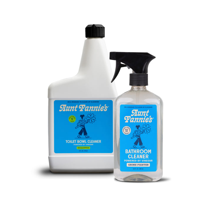 Aunt Fannie's "Buy a Toilet Bowl Cleaner, Get a Bathroom Cleaner Free" offer shown: white bottle of Toilet Bowl Cleaner and clear spray Bathroom Cleaner, both with blue labels on a white background.