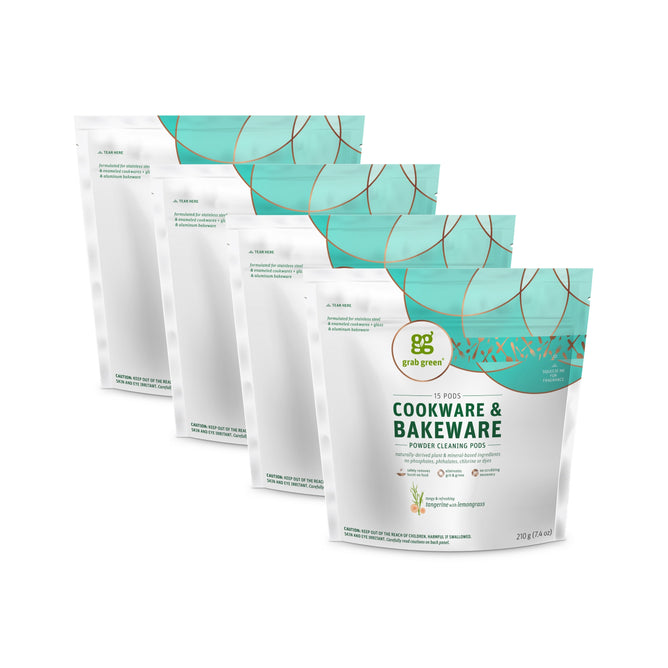 Four stand-up pouches of grab green Cookware & Bakeware Cleaner Pods - Tangerine with Lemongrass are arranged in a row, displaying their white and teal packaging. These pods provide a convenient vegan way to clean pots, pans, and bakeware.