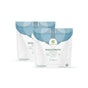 Two white and blue pouches of grab green Bleach Alternative Pods are displayed, showing the front label with product info, green logo, and text highlighting its chlorine-free bleach alternative formula.