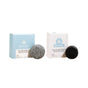The Good Juju Body & Home Scalp Care Haircare Set features a gray shampoo bar in a light blue box and a black conditioner bar in a white box, both upright on a white background.