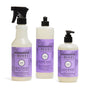 The Mrs. Meyer's Uplifting Spring Household Cleaning Set includes a lilac-scented multi-surface spray, dish soap, and hand soap in light purple and white bottles with floral designs and black dispensers.