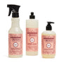 The Mrs. Meyer's Uplifting Spring Household Cleaning Set includes three rose-scented products: multi-surface cleaner spray, dish soap, and hand soap—each featuring pink floral labels on white backgrounds.