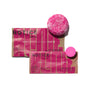 Two brown paper packages labeled NOTICE Hair Co. with bold pink branding are displayed on a white background. One package holds the ALINE Shampoo Bar, while the other contains the complimentary ALINE Mini Conditioner Bar, as part of the "Buy ALINE Shampoo Bar, Get ALINE Mini Conditioner Bar FREE" offer from NOTICE Hair Co. Both hair care products feature a vibrant pink color and are elegantly arranged side by side.