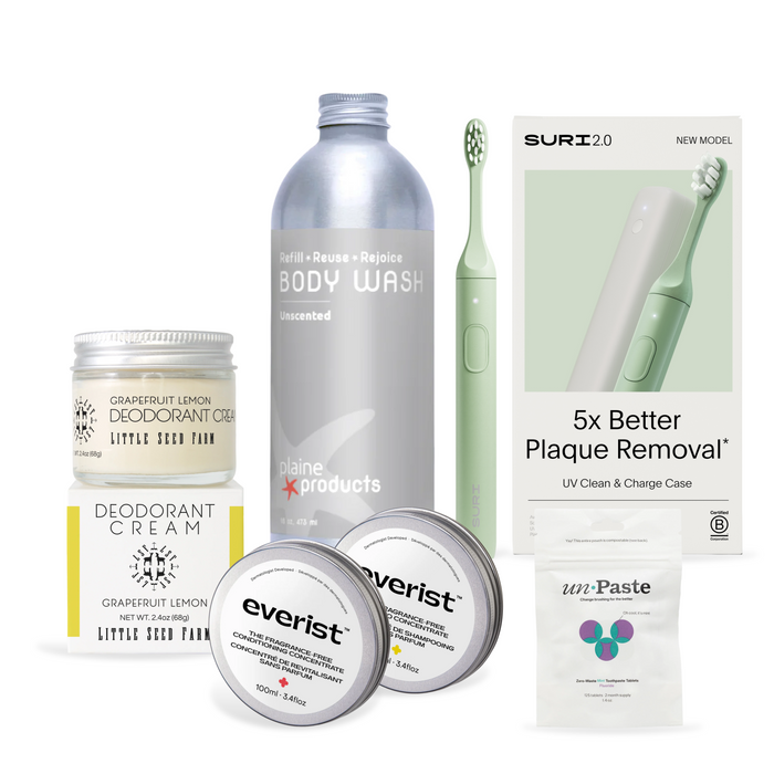 The Highest Impact Personal Care Swap Set – Everyday Body-Contact Essentials by Grove Collaborative features plastic-free items like natural deodorant, body wash, a green electric toothbrush, toothpaste tablets, and cream jars on a white background.