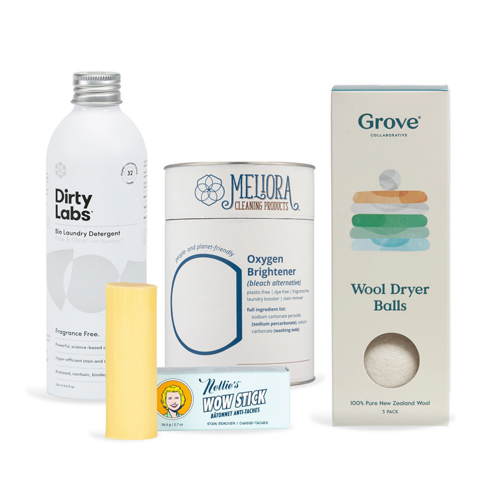 The Grove Collaborative Highest Impact Laundry Swap Set – Everyday Fabric-Contact Essentials includes plastic-free laundry must-haves like Dirty Labs Bio detergent in a metal bottle, Meliora Oxygen Brightener, dryer balls, and stain sticks.