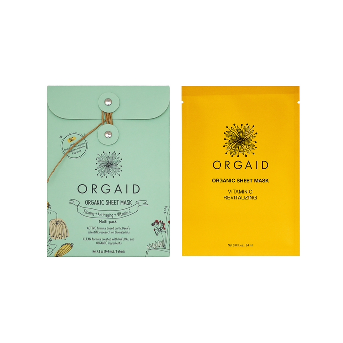 Two packets of ORGAID Organic Sheet Masks: one green multi-pack featuring a floral design and Ecoderma fabric, highlighting natural ingredients, and the other a vibrant yellow Vitamin C Revitalizing mask for a refreshing skincare experience.