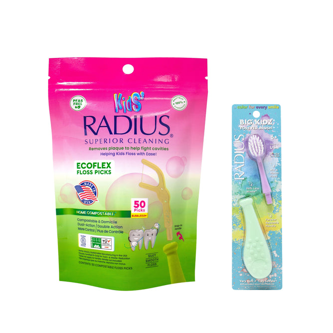 A pink and green pouch of Radius Buy Kids EcoFlex Floss Picks sits beside a packaged Radius Big Kidz Forever Brush Free, both designed for children’s oral care.