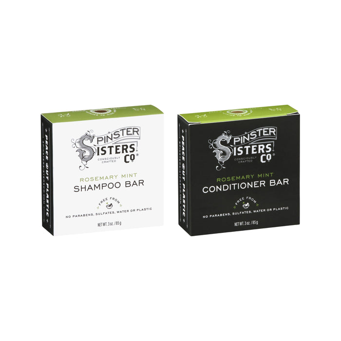 The Spinster Sisters Co. Rosemary Mint Haircare Set—includes 1.9 oz shampoo and conditioner bars in white and green boxes—displayed side by side on a white background.