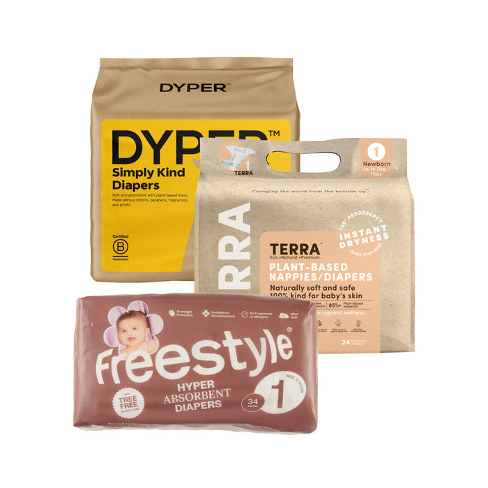 The Grove Collaborative Baby Diaper Try-It Kit features three trusted brands with distinct packaging, including a Freestyle pack with a baby photo, making it easy to compare options.