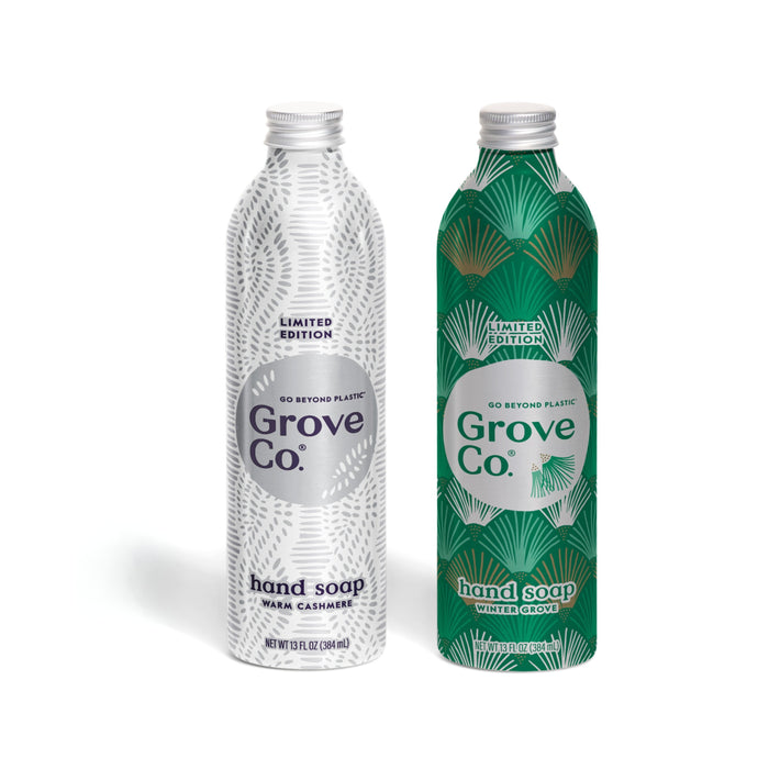 Grove Co. Hand Soap Set - Winter Collection includes two aluminum bottles of plant-based hand soap in Warm Cashmere and Winter Grove with natural origin fragrance.
