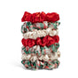 The Kitsch Holiday Ruched Satin Scrunchies Gift Set features six satin scrunchies in red, ivory, and red-green plaid, beautifully arranged on a white background.