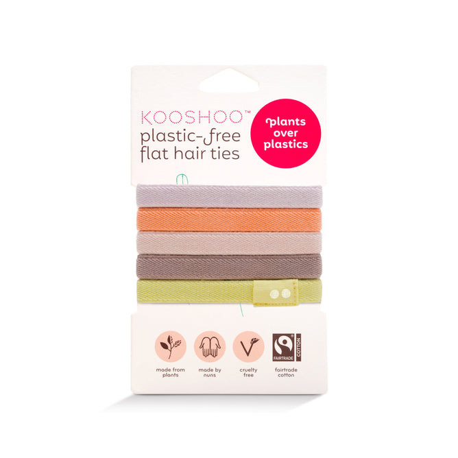 KOOSHOO Organic Hair Ties are plastic-free, zero waste, and cruelty-free. Ethically made from plant-based, fairtrade cotton, each pack includes five colors: peach, orange, light brown, light gray, and light green.