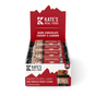 A display box of Kate’s Real Food Organic Energy Bar - Dark Chocolate Cherry & Almond provides sustained energy. Each box contains several individually wrapped bars in red packaging with the brand’s real food imagery.
