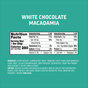 Nutrition label for Kate’s Real Food Organic Energy Bar (White Chocolate Macadamia), featuring calories, fat, carbs, and a full ingredient list—including oats and honey—on a teal background with “WHITE CHOCOLATE MACADAMIA” boldly displayed in white at the top. Ideal for anyone looking for organic energy bars or clean energy snacks.