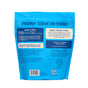 Back of a blue Aunt Fannie's Laundry Detergent Powder - Extra Strength pouch with instructions, ingredients, enzyme-powered stain removal, no harsh chemicals, people & pet friendly benefits, and a list of excluded harmful substances.