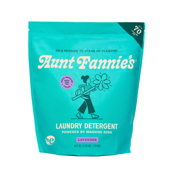 Aunt Fannie's Laundry Detergent Powder—Powered by Washing Soda—comes in a teal pouch with lavender scent, contains 70 loads per bag, and features a woman with a large flower on the packaging.
