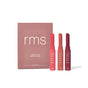 Three rose-colored lipstick tubes and a pink Legends to Love box from RMS Beauty are displayed on white. The Legends to Love Kit features full-size, long-lasting serum lipsticks in red, pink, and mauve shades.