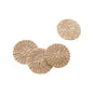 Four LIKHA Abaca Coasters, set of 4—handmade by artisans from sustainable materials—are displayed on a white background, three grouped together and one slightly apart at the top right.