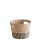 The LIKHA Abaca Tapered Basket is a round handwoven organizer made from manila hemp, with side handles and a natural tan top above a black-and-tan striped base—perfect for ethical home organization.