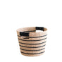 The LIKHA Abaca Tapered Basket in Black + Natural stripes, crafted from durable Manila hemp fiber with black handles, is an ethically made storage piece shown against a white background.