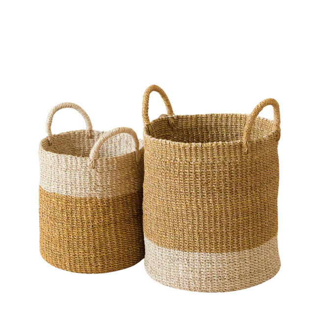 The LIKHA Abaca Cylinder Basket with handles, a nested set of 2, features thick natural and white stripes and artisan charm, shown side by side on a white background.