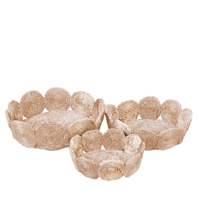 The LIKHA Abaca Fruit Basket Circles, set of 3, features round handcrafted baskets in varying sizes with raised swirl designs, made from sustainable abaca fiber in light tones—an elegant natural accent for any space.