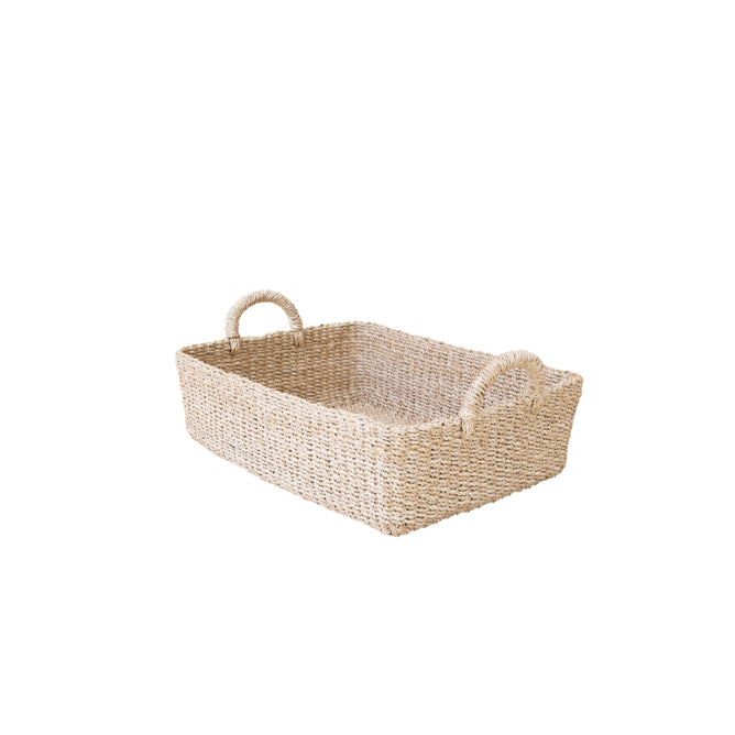 The LIKHA Abaca Rectangle Tray with Handles is a handwoven, natural-fiber tray featuring two rounded handles and a rectangular shape, shown on a white background.