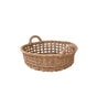 The LIKHA Abaca Round Tray Open Weave with Cutout Handles is ethically crafted from natural Manila hemp fibers, featuring open sides and two cutout handles, shown against a white background.