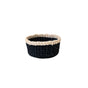 The LIKHA Abaca Mini Trinket Basket is a round, woven design made from sturdy Abaca fiber with a black body and contrasting light beige rim, shown against a plain white background.