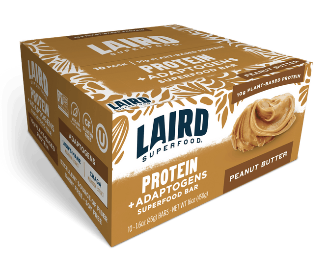A box of Laird Superfood Peanut Butter Protein Bars, in brown and white packaging with a peanut butter swirl, highlights "10g plant protein" and contains 10 superfood bars.