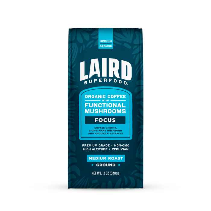 Laird Superfood FOCUS Medium Roast Ground Coffee, 12 oz (340g), blends organic Peruvian coffee with functional mushrooms, including Lion’s Mane, coffee cherry, and rhodiola for clarity and energy. Comes in a teal and blue bag labeled "Focus.