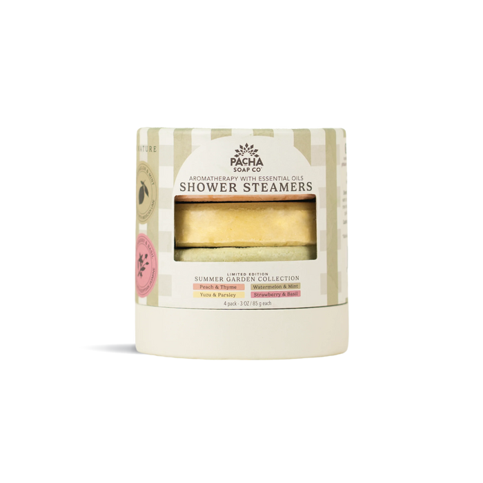 A white Pacha Soap Co. Shower Steamers Set - Summer Garden container, labeled with essential oils. The package features four aromatic tablets and emphasizes garden-inspired scents from the Summer Garden Collection.