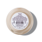 A round cream-colored glass jar viewed from above, showing a label with product details, warnings, and a barcode. The label highlights Summer Signature Candle by Pacha Soap Co. and safety instructions in black text.