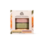 The Pacha Soap Co. Shower Steamer Set - Autumn Heirlooms Collection features a box containing four labeled autumn-inspired scents: Golden Spice & Chai, Maplewood & Bergamot, Fig Leaf & Pear, and Spiced Pumpkin & Amber. Through the package window, two round handcrafted shower steamers are visible.