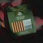 Green gift box containing a Bar Soap & Soap Dish Gift Set - Balsam & Pine, featuring a soap dish made of red alder wood and tied with a velvet ribbon.
