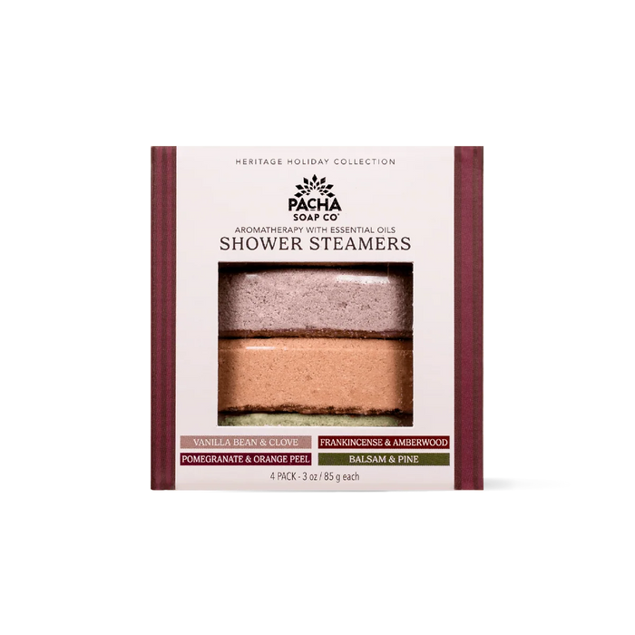 Pacha Soap Co. Shower Steamer Set - Heritage Holiday Collection, featuring four square shower steamers stacked vertically and labeled with Vanilla Bean & Clove, Frankincense & Amberwood, Pomegranate & Orange Peel, and Balsam & Pine scents.