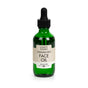 Lovett Sundries Face Oil comes in a green glass bottle with a black dropper. The label, featuring a minimal vintage design, describes an unscented blend of antioxidant-rich organic oils that promote skin elasticity.