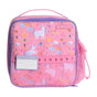 The Chomper Kids Lunch Bag by Elemental features pink fabric with unicorn and rainbow designs, purple trim, a mesh side pocket, a "Hello! My name is" tag holder, and the Elemental logo—making lunchtime extra fun.