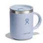 The light blue Hydro Flask stainless steel mug, 12 oz, features a splash-resistant lid and sturdy handle with the iconic logo, offering a sleek design perfect for hot drinks.