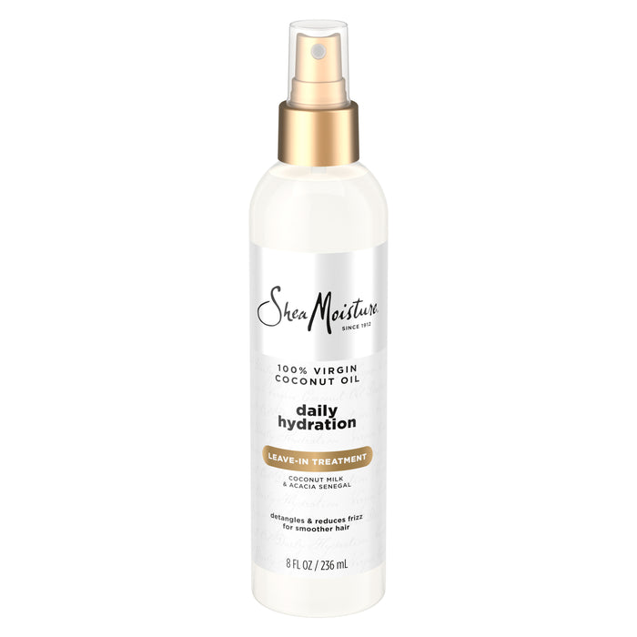 A bottle of SheaMoisture 100% Virgin Coconut Oil Leave in Treatment, 8 fl oz, featuring a spray nozzle, is designed to effortlessly detangle hair and reduce frizz for smoother, healthier-looking results.
