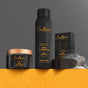 SheaMoisture’s African Black Soap Bar Soap with Shea Butter is showcased on a wet surface with water droplets, set against a gray and orange background.