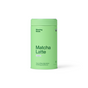 A light green cylindrical container labeled Morning Made Matcha Latte - 60 servings, featuring ceremonial grade matcha packed with antioxidants. Sleek, modern packaging reads: Your coffee alternative for energy and focus.