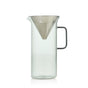 The AdHoc Stainless Steel & Glass Pour Over features a clear borosilicate glass pitcher with a simple handle and a built-in fine mesh stainless steel filter, displayed against a plain white background.